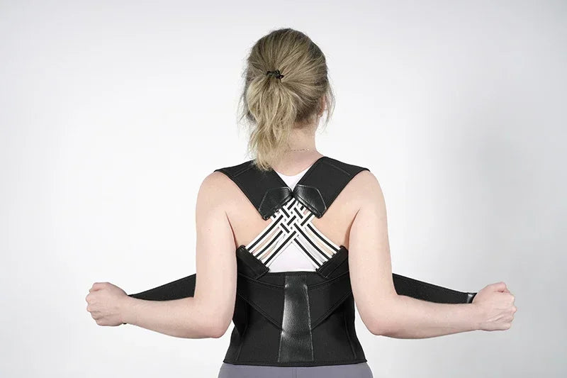 TrevioMart women's back posture brace worn on upper back with adjustable straps for support