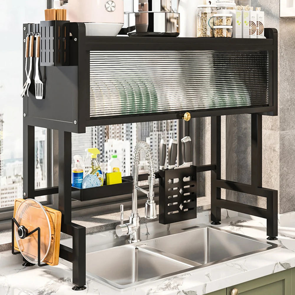 Black over the sink dish rack with storage holding plates, knives, and kitchen utensils above a double sink