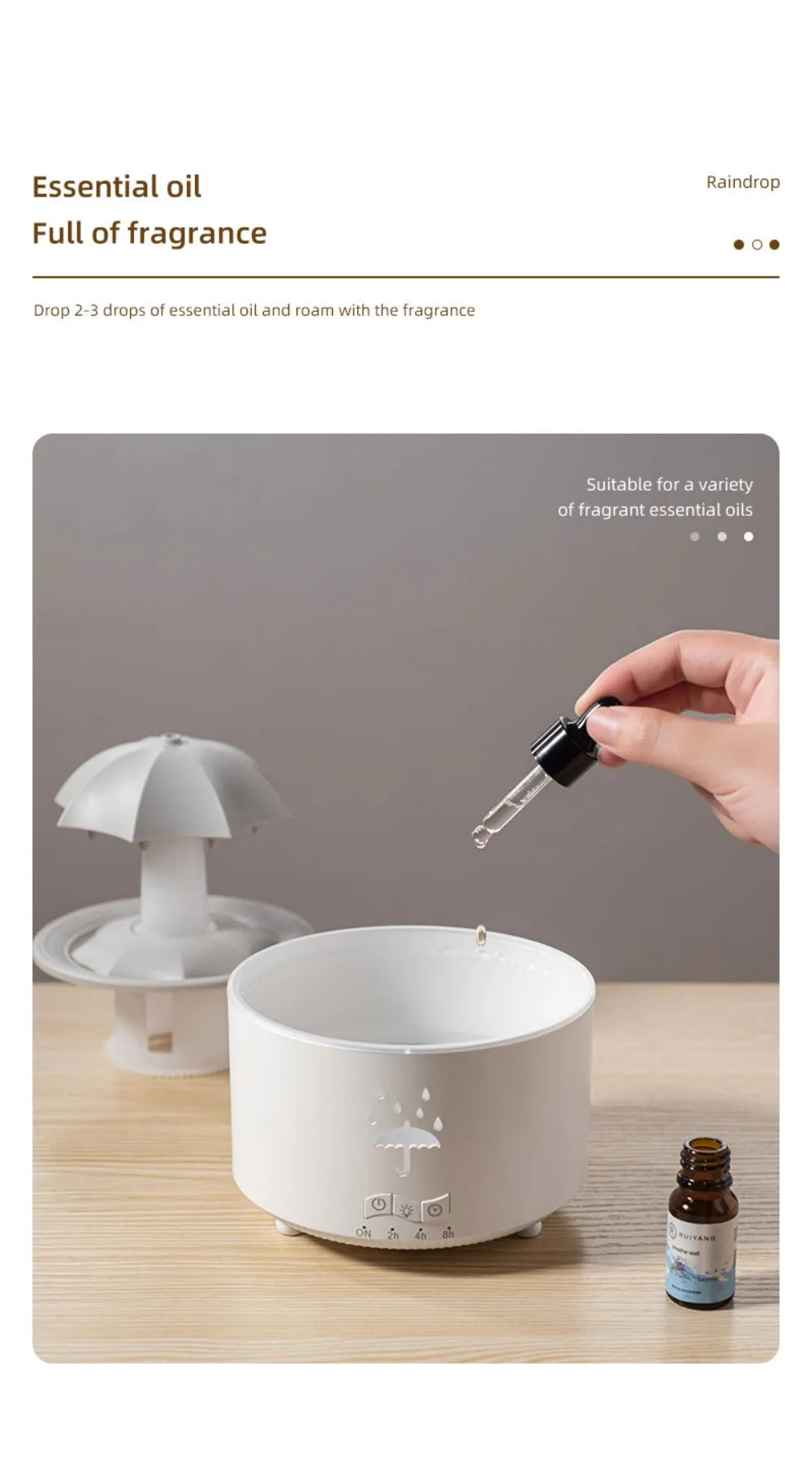 TrevioMart raindrop air humidifier white with umbrella design and essential oil dropper on wooden surface