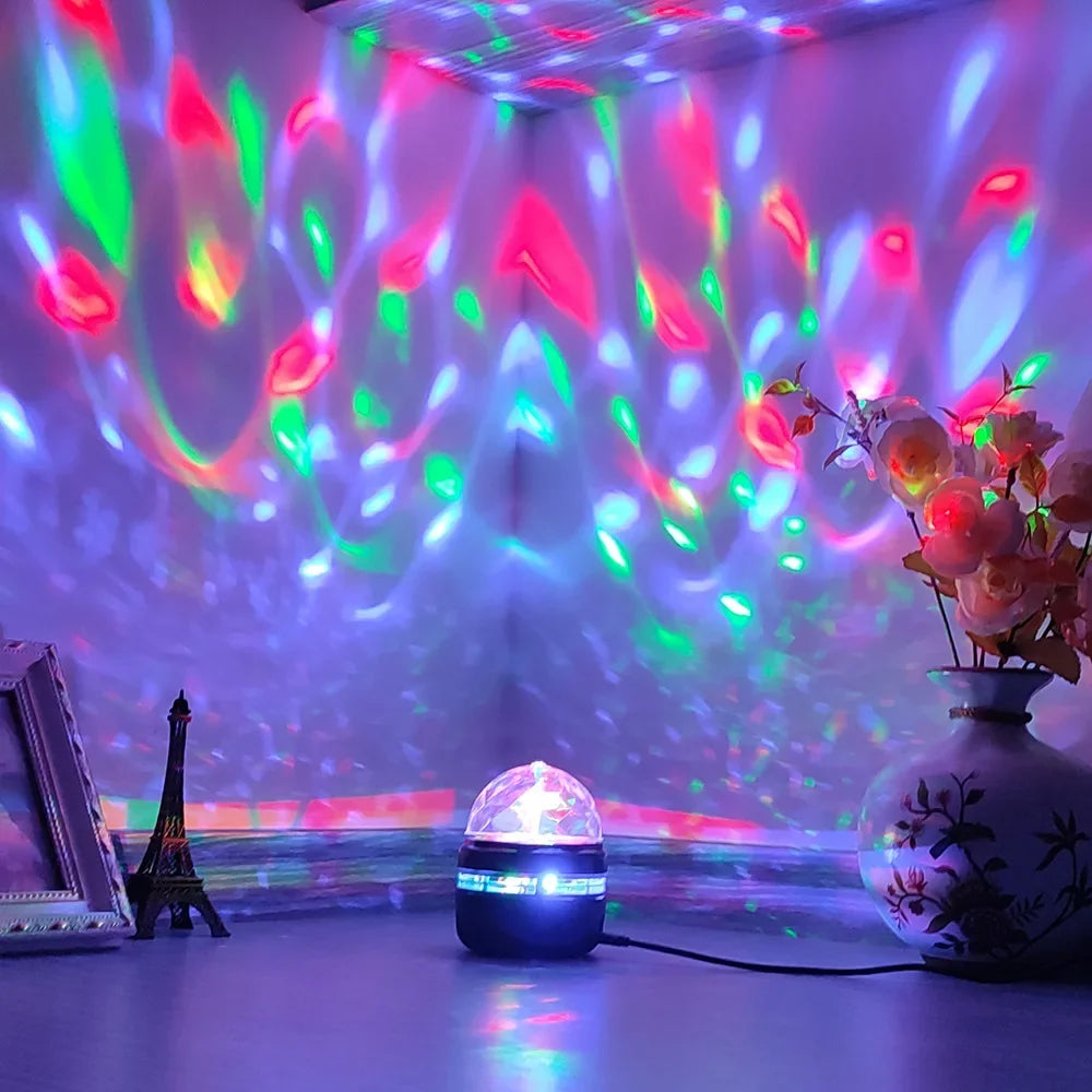 Starry sky light projector with remote casting colorful patterns on wall in a cozy room